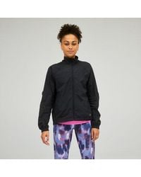 New Balance - Chaqueta Impact Run Light Pack - Lyst