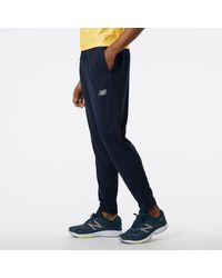 New Balance - Pantalones nb tech training knit track - Lyst