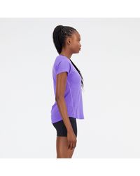 New Balance - Impact run short sleeve in violett - Lyst