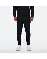 New Balance - Tech knit pant in nero - Lyst
