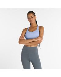 New Balance - Nb Essential Train Bra - Lyst