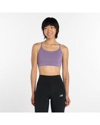 New Balance - Nb Essential Yoga Bra - Lyst