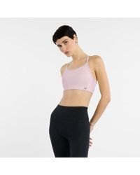New Balance - Nb Essential Yoga Bra - Lyst
