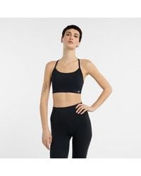 New Balance - Nb Essential Yoga Bra - Lyst