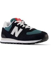 New Balance - 574 in nero/grigio - Lyst