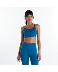 New Balance - Nb Essential Yoga Bra - Lyst
