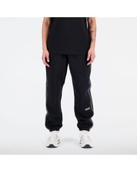 New Balance - Essentials Brushed Back Fleece Pant In Black Cotton Fleece - Lyst