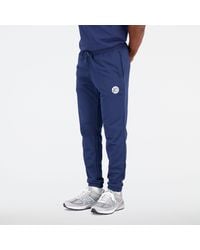 New Balance - Pantaloni nb hoops essentials fundamental in blu - Lyst