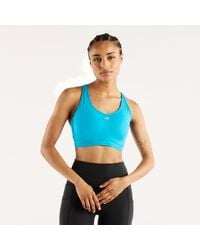 New Balance - Nb Essential Run Bra - Lyst
