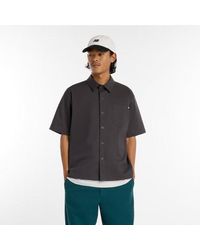 New Balance - Numeric Button Up Shirt - Lyst
