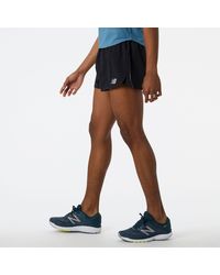 New Balance - Pantalones cortos impact run 3 inch split - Lyst