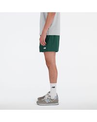 New Balance - Athletics Stretch Woven Short 5" In Green Polywoven - Lyst