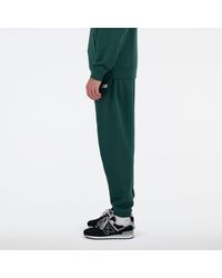 New Balance - Sport essentials fleece jogger in verde - Lyst