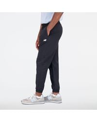 New Balance - Sport Essentials Premium Woven Pant In Nylon Woven - Lyst