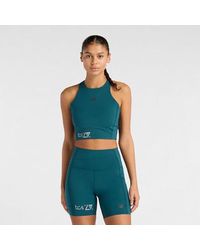 New Balance - Mujer London Edition Nb Sleek Storage Race Crop En, Poliéster, Talla - Lyst