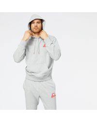 New Balance Nb Essentials Stacked Rubber Po Hoodie - Grijs