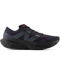 New Balance - Fuelcell Rebel V4 In Grey/black/red Synthetic - Lyst