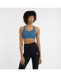 New Balance - Nb Essential Train Bra - Lyst