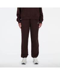 New Balance - Linear heritage brushed back fleece sweatpant in nero - Lyst
