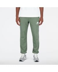 New Balance - Essentials Stacked Logo French Terry Sweatpant In Green Cotton Fleece - Lyst
