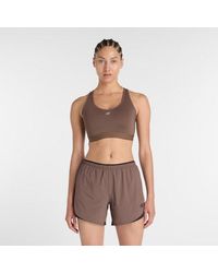 New Balance - Nb Essential Run Bra - Lyst