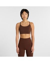 New Balance - Nb Essential Yoga Bra - Lyst