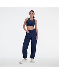 New Balance - Athletics Stretch Woven jogger In Blue Poly Knit - Lyst