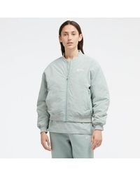 New Balance - Damen Linear Heritage Woven Bomber Jacket - Lyst