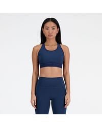 New Balance - Nb Sleek Medium Support Sports Bra In Blue Poly Knit - Lyst
