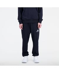 New Balance - Essentials Stacked Logo French Terry Sweatpant In Black Cotton Fleece - Lyst