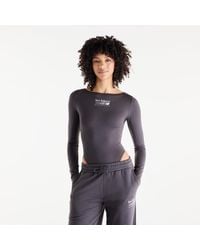 New Balance - Mujer Trackside Long Sleeve Bodysuit En, Poly Knit, Talla - Lyst