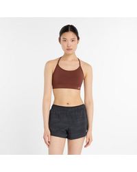 New Balance - Nb Essential Yoga Bra - Lyst