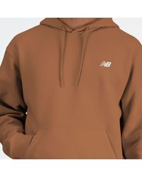 New Balance - Sport essentials french terry hoodie in marrone - Lyst