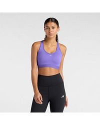 New Balance - Nb Essential Run Bra - Lyst
