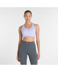 New Balance - Nb Essential Run Bra - Lyst