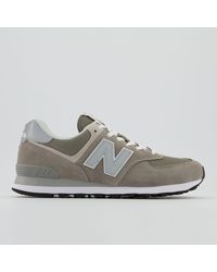 solid white new balance shoes