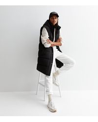 New Look - ' Long Hooded Puffer Gilet - Lyst