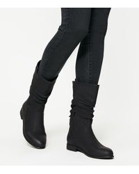 new look long black boots