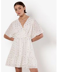 Apricot - Peplum Hem Mini Wrap Dress New Look - Lyst