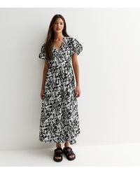New Look - Abstract Print Puff Sleeve Wrap Midi Dress - Lyst