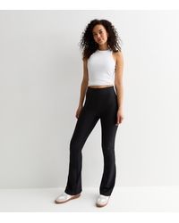 New Look - Tall Ribbed Flared Leggings - Lyst