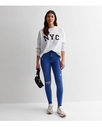 New Look - Tall Ripped Knee Hallie Super Skinny Jeans - Lyst