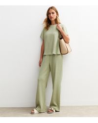New Look - Soft Touch Textured Wide Leg Trousers - Lyst