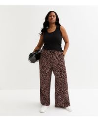 New Look - Plus Size Textured Animal Print Wide Leg Trousers Curves - Lyst