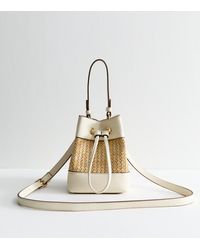 New Look - Faux Leather And Raffia Look Drawstring Mini Bag - Lyst