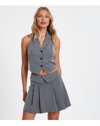 Quiz - Pinstripe Pleated Mini Skirt New Look - Lyst