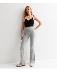 New Look - Light Foldover-Waist Flare Leggings - Lyst