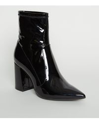 new look pointed block heeled boots in black croc