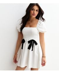 New Look - Shirred Bow Front Mini Dress - Lyst