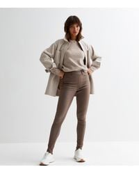 New Look - Coated Leather-Look Mid Rise Lift & Shape Emilee Jeggings - Lyst